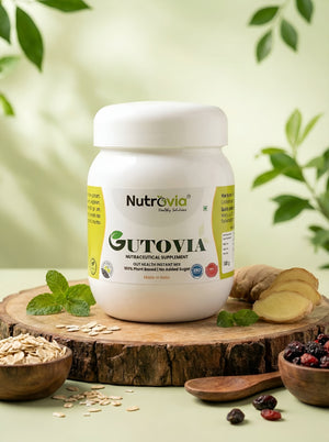 Nutravida Gutovia supplement jar on a wooden surface with natural ingredients in the background